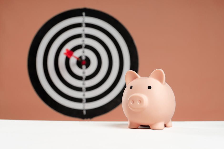 A piggy bank in front of a dartboard symbolizing financial goals and smart savings.